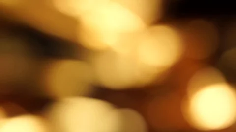 Blurred bokeh glow hearth fire blurred sparkles Stock Footage 87657384