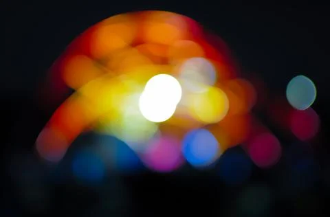 Blurred bokeh Light on a dark background. Stock Photos