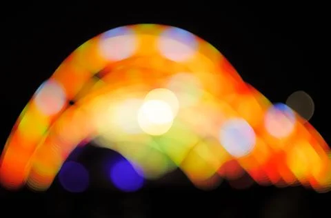 Blurred bokeh Light on a dark background. Stock Photos