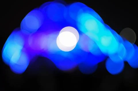 Blurred bokeh Light on a dark background. Stock Photos