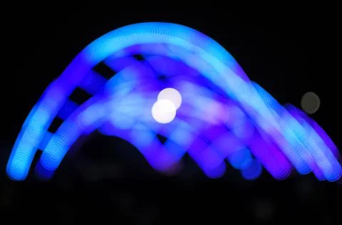 Blurred bokeh Light on a dark background. Stock Photos