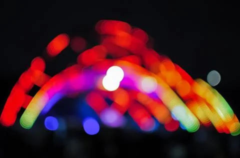 Blurred bokeh Light on a dark background. Stock Photos