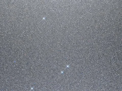 Blurred bokeh light on gray silver background Illustrazione stock