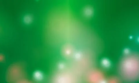 Blurred bokeh light on green background. Abstract glitter defocused. Stock Illustration