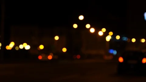 Blurred bokeh traffic on the road at night in a big city. Stock Footage 119532525