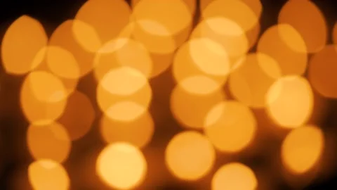 Blurred burning candles on a black background Stock Footage 171543586