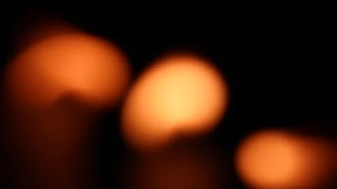 Blurred candle flames blinking in the wind Video stock 127564519