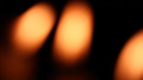 Blurred candle flames blinking in the wind Stock Footage 127564935