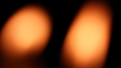 Blurred candle flames blinking in the wind Stock Footage 127565341