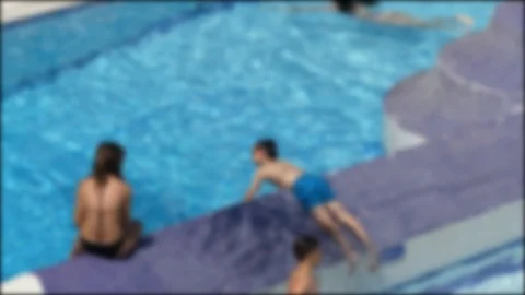 Blurred Children By The Pool Vídeo Stock 97333476