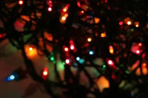 Blurred christmas light string Stock Photos
