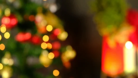 Blurred christmas tree and light christmas and blink light candle Stock Footage 99534538