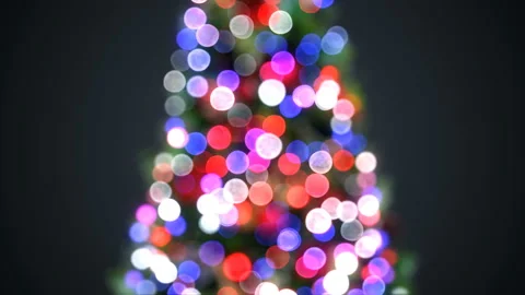 Blurred Christmas Tree Lights Blinking in Defocused Bokeh. Greeting Background Stock Footage 97523112