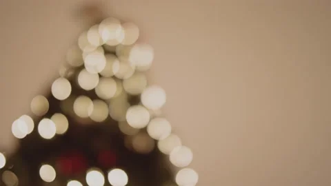 Blurred Christmas Tree Top with Bright White Lights Stock Footage 172264552