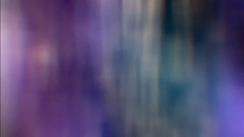 Blurred cinematic background. Shining colored stripes. Video stock 145279732