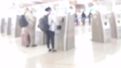 Blurred cinematic shot of people using self machine Stock Footage 249774595