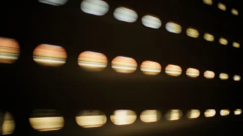 Blurred circular light spots forming an abstract pattern against a dark Stock Footage 343268273