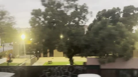 Blurred City Building Viewed Through Train Window Stock Footage 345265588