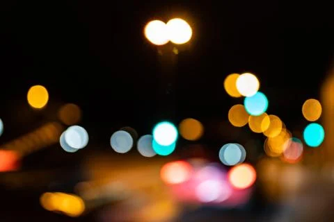 Blurred city lights of an intersection at night Foto stock