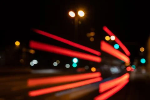 Blurred city lights of an intersection at night Foto stock