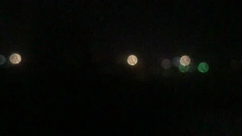 Blurred city lights reflection on the train window at night Video stock 154286496