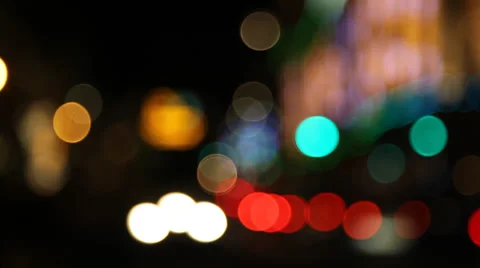 Blurred city lights with tram Видео 33666304