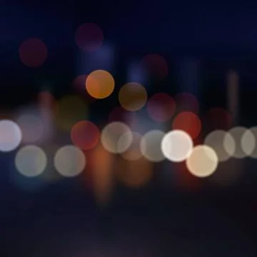 Blurred city at night, vector background. Blurred city at night background... Stock Photos