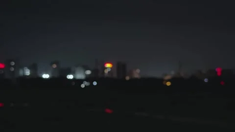 Blurred cityscape at night with glowing lights creating a dreamy and abstra.. Stock Footage 340052521