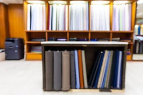 Blurred classic traditional generic bespoke tailoring shop interior with cutting Stock-Fotos