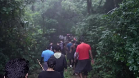 Blurred close-up of tourists or students hiking in the rainy Western Ghats .. Stock Footage 314206112