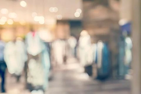 Blurred clothing store interior Stock Photos