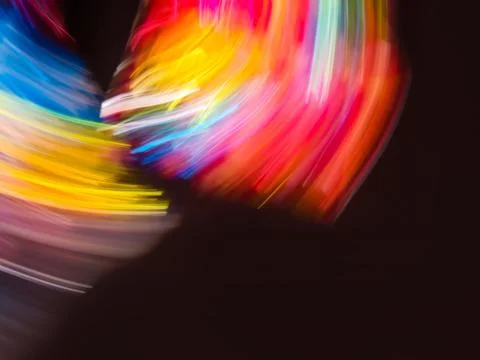 Blurred colored abstract smooth transitions of iridescent  neon colors on bla Foto stock