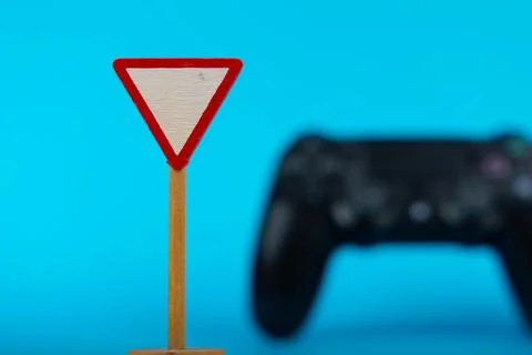 Blurred Console Controller with Wooden Sign Stock Photos