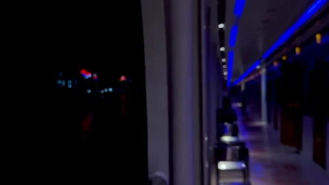 Blurred corridor with blue neon lights creating a futuristic ambiance in a .. Stock-Footage 340220762