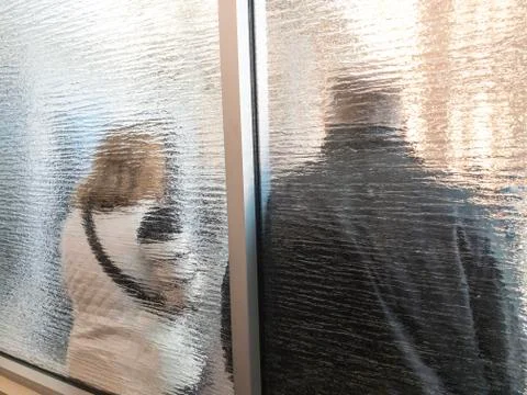 Blurred couple waiting in a queue Stock Photos