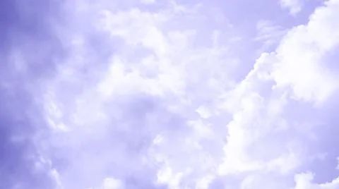 Blurred Creative cloudscape on the sky violet tones. Stock Photos