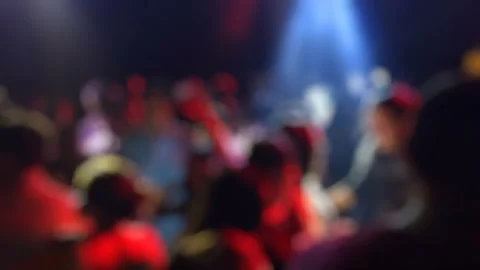 Blurred Crowd Dancing at Night Club Party with Colorful Lights Stock Footage 348242552