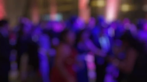 Blurred Crowd Dancing at Night Party with Colorful Lights Stock Footage 348242526