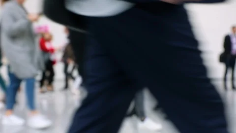 Blurred crowd of people passing close by at a convention Stock Footage 119021998