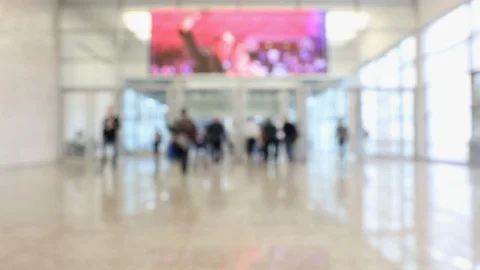 Blurred crowd of people passing by in hallway during conference Stock Footage 119022149