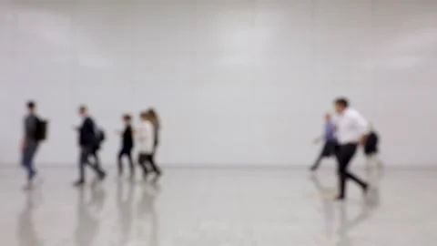 Blurred crowd of people passing in one direction at a conference Stock Footage 154946786