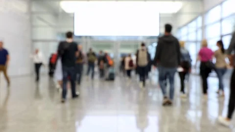 Blurred crowd of people passing through shot at a conference Stock Footage 123281069