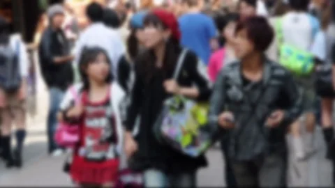 Blurred crowd of people in Takeshita dori, Harajuku district, Tokyo, Japan Video stock 74088739