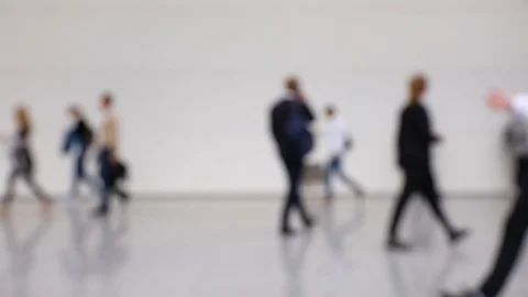 Blurred crowd of people walking by in a hallway Stock Footage 119823622