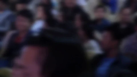 BLURRED CROWD SEATED AT WAITING AREA Stock Footage 107028552