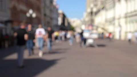 Blurred crowd of tourists people walking along the street of the old city Stock Footage 108774953