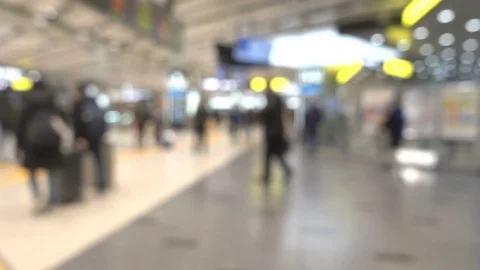 Blurred the crowd walking around the train  station hall Stock Footage 84877523