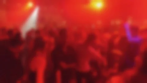Blurred dancefloor techno disco with flashing lights and large crowd of dancers Stock-Footage 92490279