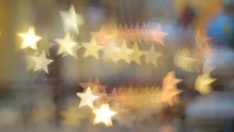 Blurred (defocus effect) indoor scene with bokeh as Christmas star Stock Footage 82411792