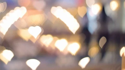 Blurred (defocus effect) indoor scene with bokeh light as heart shape Stock Footage 82418092